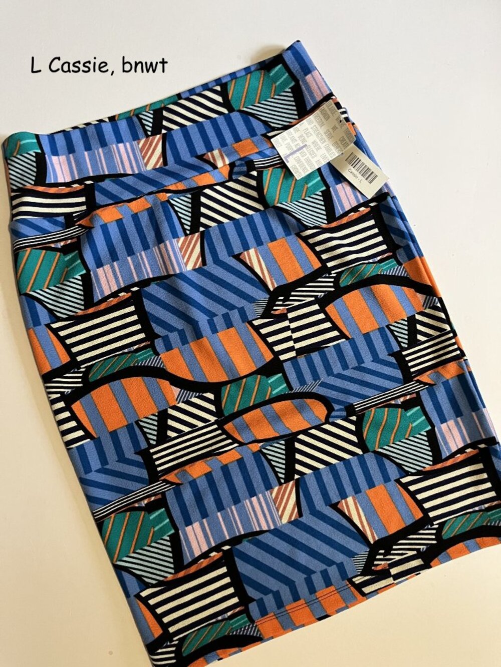 Large Lularoe Cassie pencil skirt, colorful geometric stripes